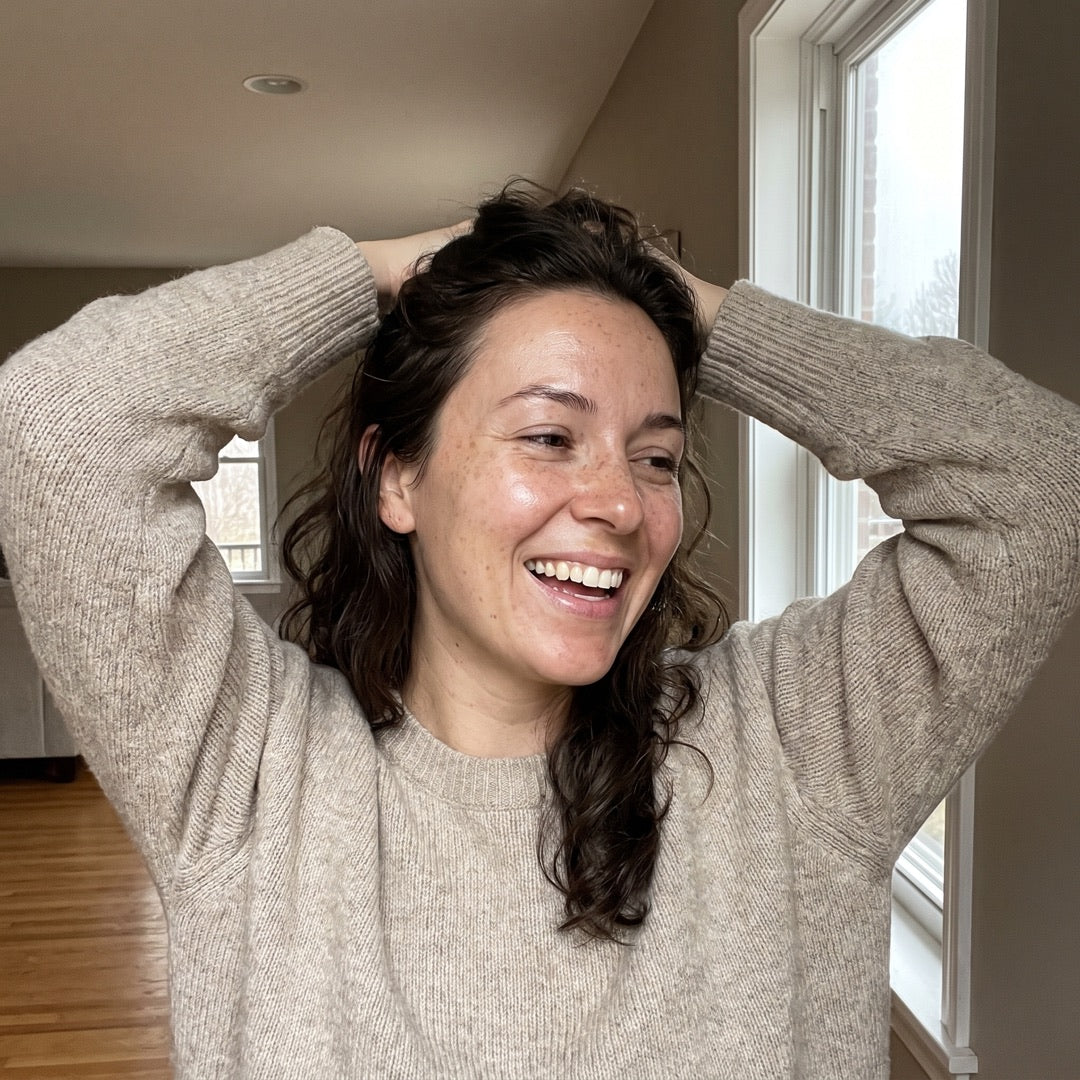 Laughing by the window, bare glowing skin