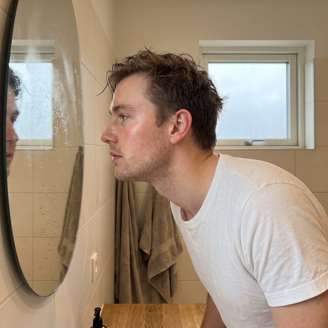 Post-shave check-in at the bathroom mirror
